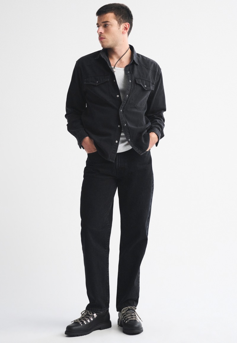 black western denim shirt with black jeans and hiking boots monochromatic outfit for men