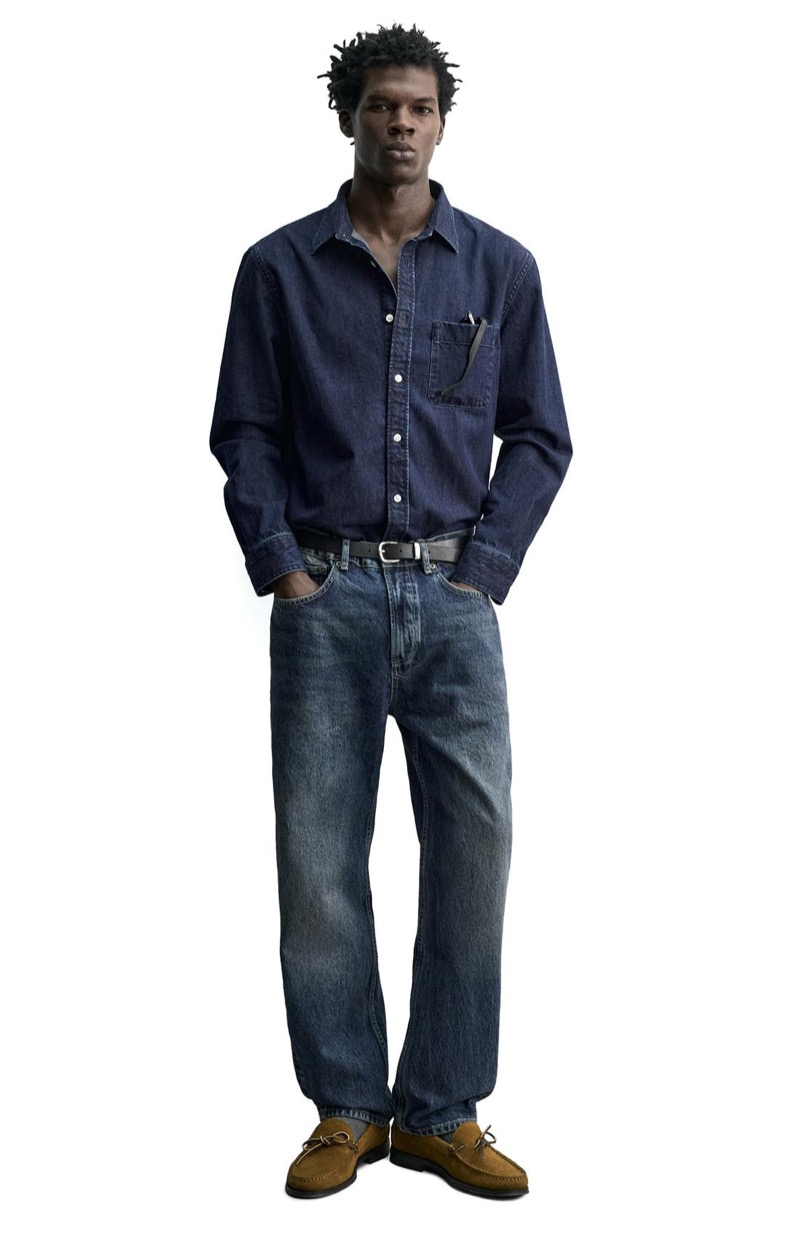 dark indigo denim shirt outfit with mid-wash jeans and suede boat shoes for men