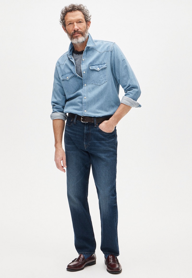light blue western denim shirt tucked into dark jeans with brown leather loafers