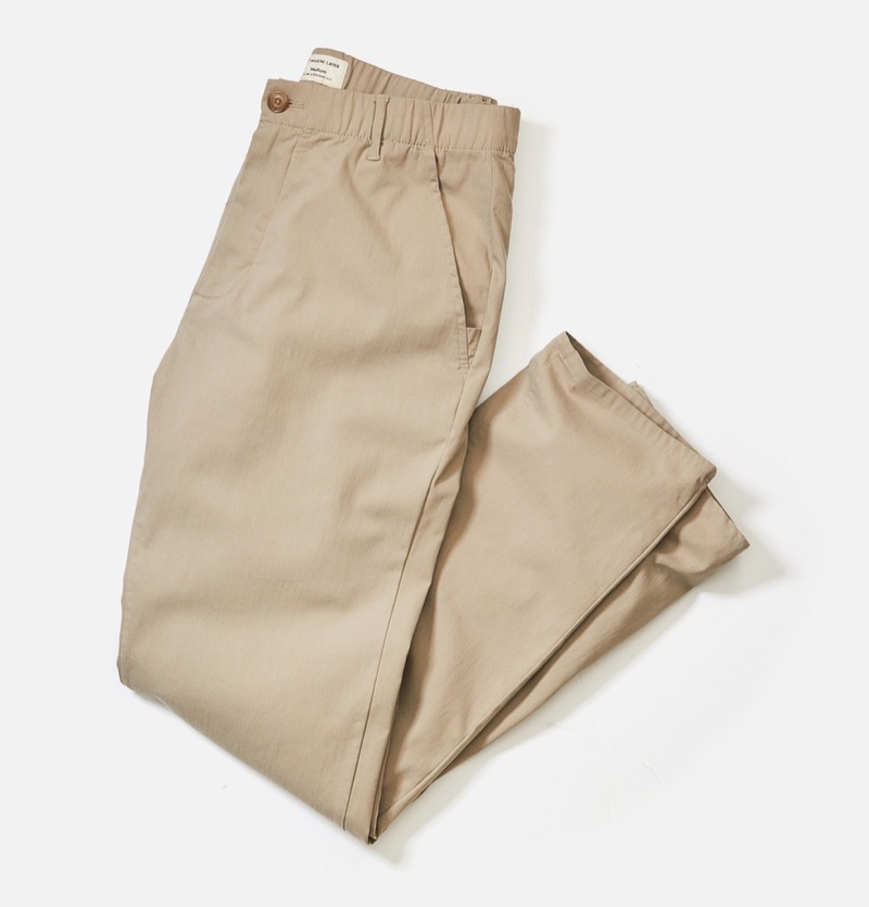 folded pair of chinos