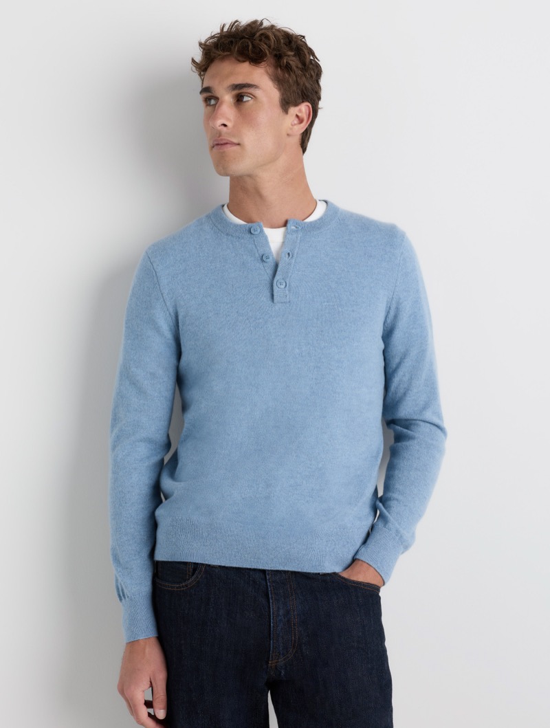 Light blue cashmere henley sweater with a button placket