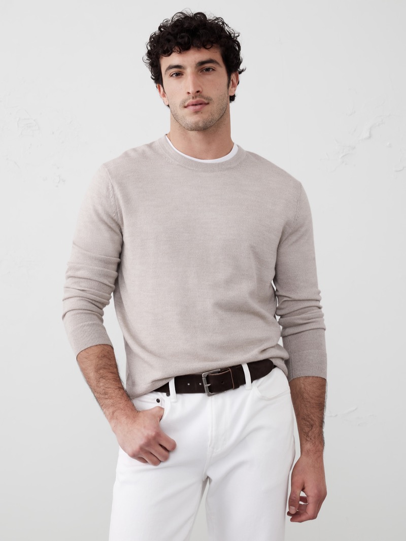 Beige merino wool crewneck sweater with ribbed cuffs