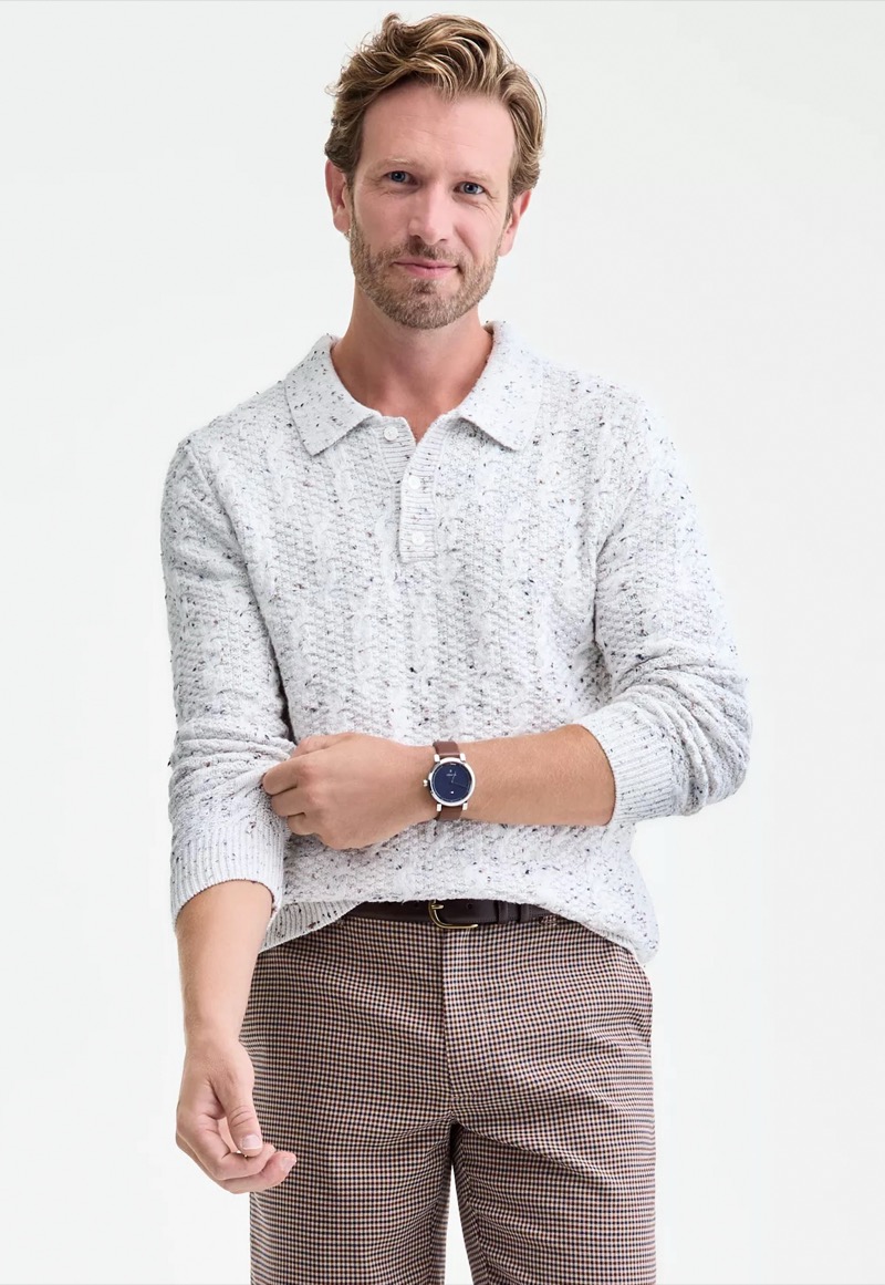 Speckled white knit polo sweater with a flat collar