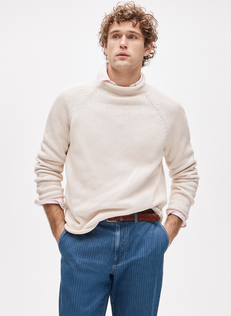 Cream rollneck sweater with a relaxed unfitted collar