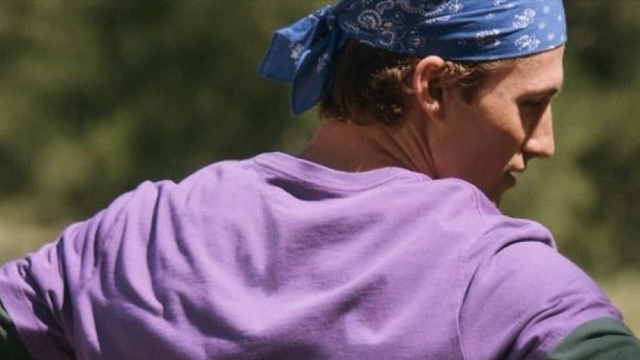 A purple tee, green long-sleeve top, and blue bandana in J.Crew’s Camp Crew campaign.